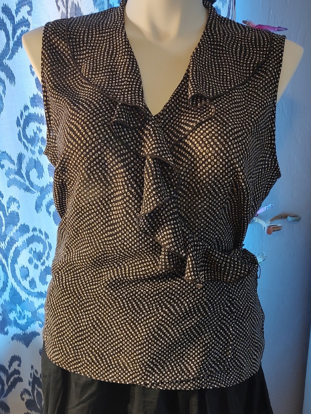 New York & Company Black and White Ruffle V-Neck Sleeveless Top. Wrap around